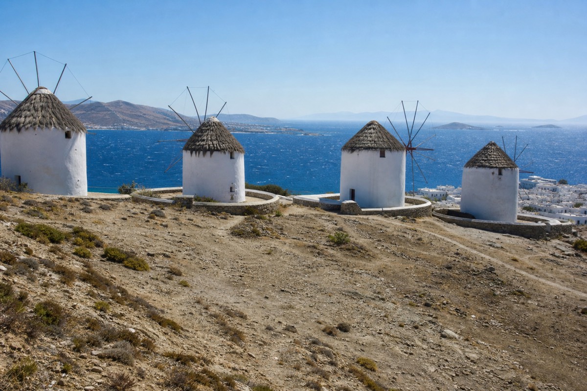 The windmills above Mykonos Town, one of the islands to skip in Greece for a quiet stay